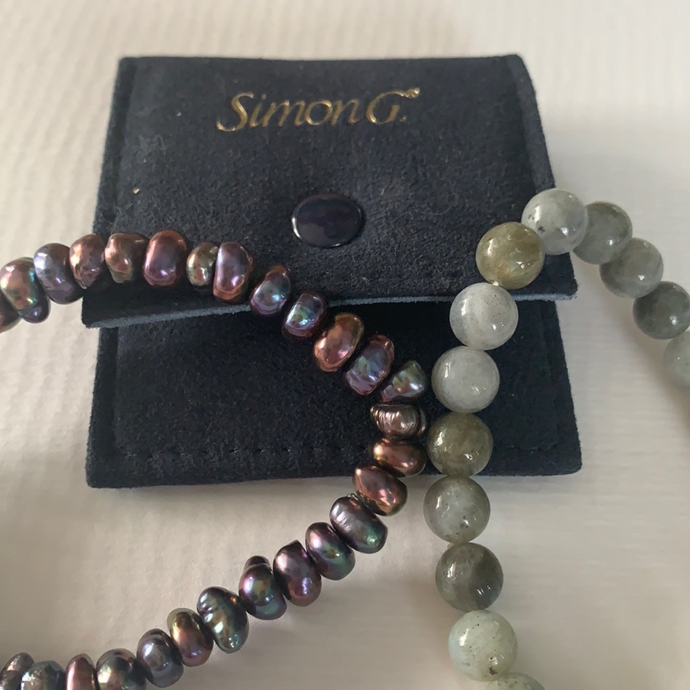 Simon g Beas bracelets.